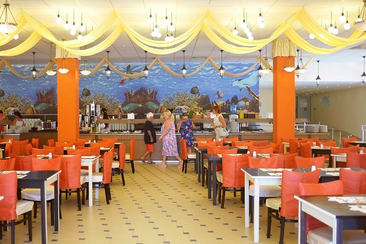 Mpm Astoria Hotel Pantai Sunny Bagian luar foto