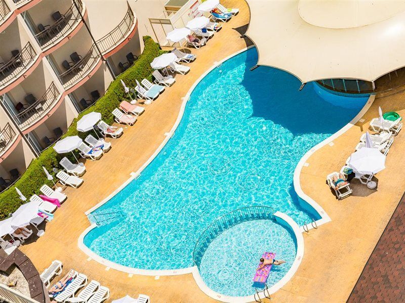 Mpm Astoria Hotel Pantai Sunny Bagian luar foto
